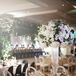 Tall Clear Centerpiece with White Roses and Hydrangeas