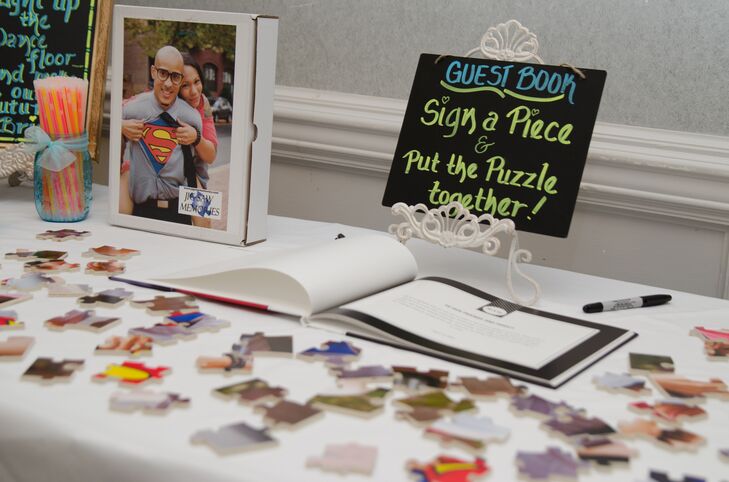Instead of a traditional guest book, Mari and Mike had their guests sign pieces of a puzzle that featured one of their engagement pictures.