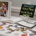 Instead of a traditional guest book, Mari and Mike had their guests sign pieces of a puzzle that featured one of their engagement pictures.