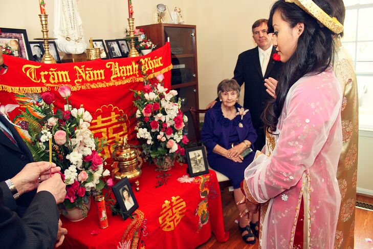 For the Vietnamese ceremony, the wedding party visited Natalie's grandmother's house bearing gifts and asking for the blessing of their ancestors. For this part of the day, Natalie changed into a dark pink ao dai.