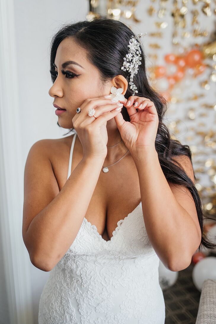 Bride Getting Ready and Putting on Earrings