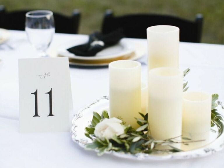 pillar candles on silver tray as wedding centerpiece