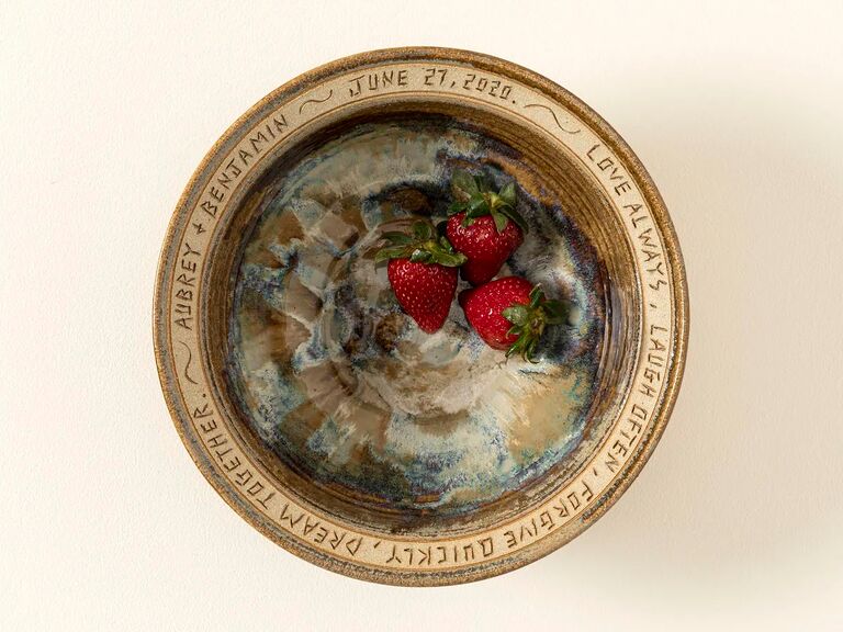 Beautiful serving bowl featuring the couples' names and an antique glaze. 