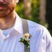 The boutonnieres were a mix of a small blush rose and baby’s breath that matched both Francesca's larger bridal bouquet and the full baby's breath bridesmaid bouquets.