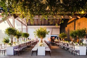 Greenery-Filled Reception with Tall Centerpieces and Hanging Greenery Installation