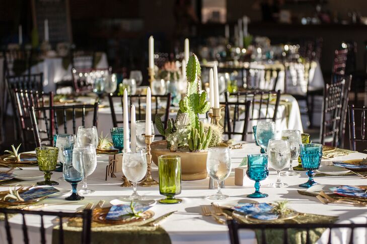 Colorful vintage glassware matched the day's green and blue palette and matched the cactus centerpieces.
