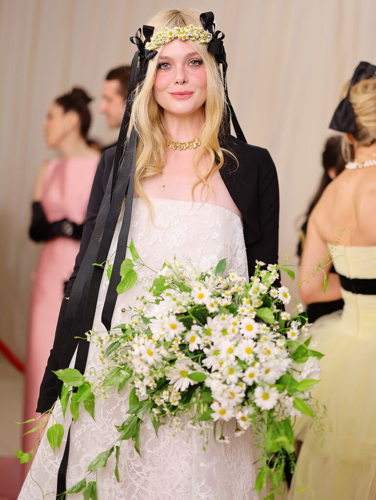 BuzzFeed on X: Emma Stone re-wore her Louis Vuitton wedding dress, having  married Dave McCary in the summer of 2020.  / X