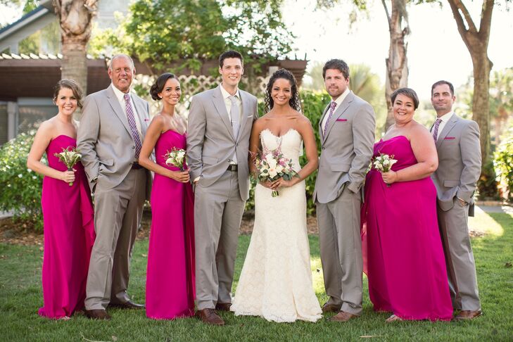 Jami wanted her bridesmaids to stand out during the ceremony, so she picked out long dresses in a can’t-miss hue. Each woman wore a floor-length tutti-frutti fuchsia gown with a strapless sweetheart neckline that Jami picked out from the Dessy Group. A single ruffle detail accented the skirt for an extra touch.