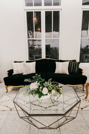 Modern Lounge Area with Black Chaise and Geometric Table