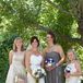 Jen chose a short gray J Crew dress with a sweetheart neckline for her maid of honor. The flower girls wore a mix of knee-length champagne colored dresses.