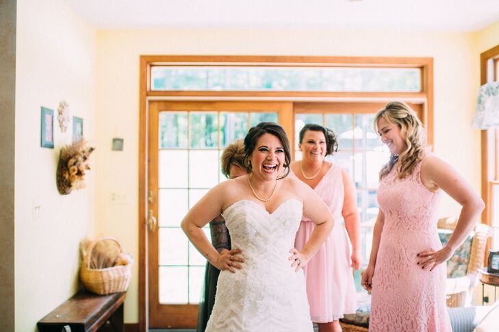 “I went to a trunk show at the Wedding Store by Liz Clinton and tried on a bunch of dresses,” Kim says. “When I saw this one, I started shaking back and forth. It was just perfect.” On their wedding day, she slipped on an A-line dress by Justin Alexander. Lace highlighted her strapless sweetheart neckline and cascaded down the dress in tiers of chevron patterns. The gown even captured that vintage feel she wanted with lace appliques between each layer.
