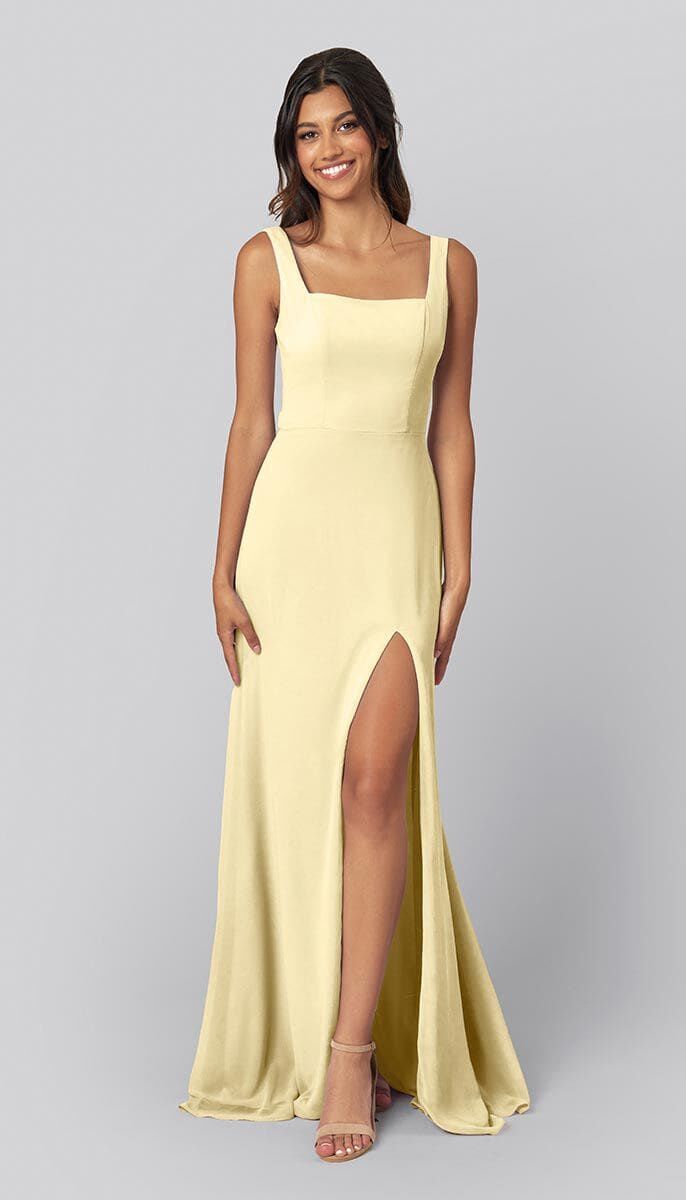 Model wears a butter yellow dress with a square neckline. 