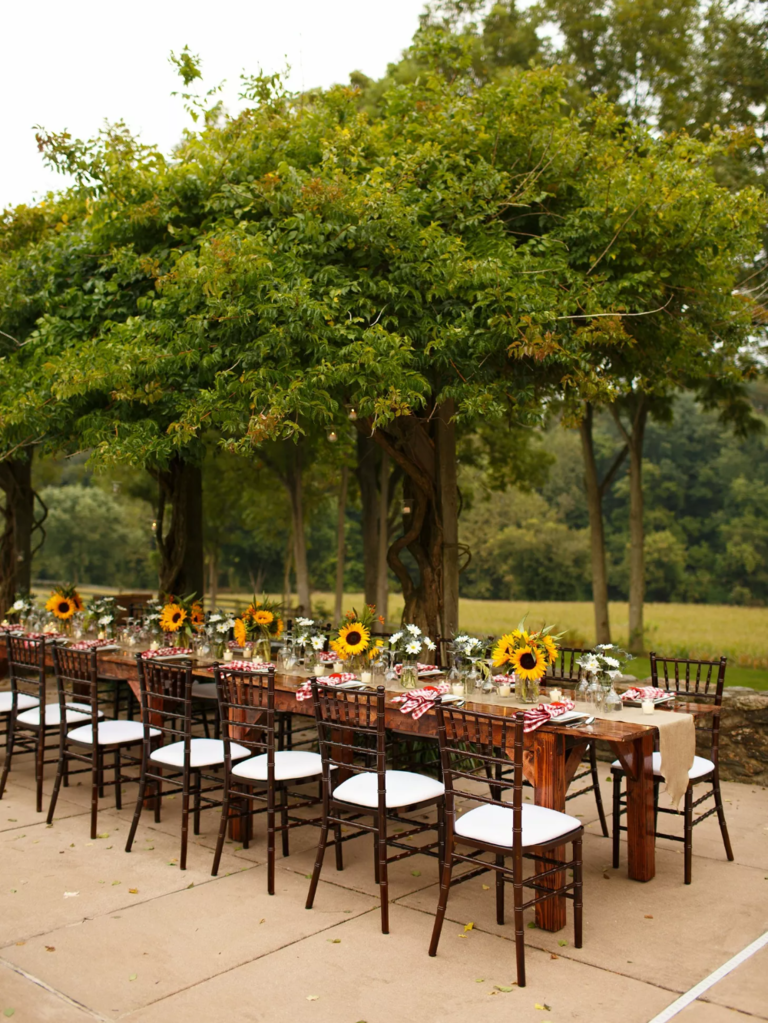 rustic farm table at rehearsal dinner
