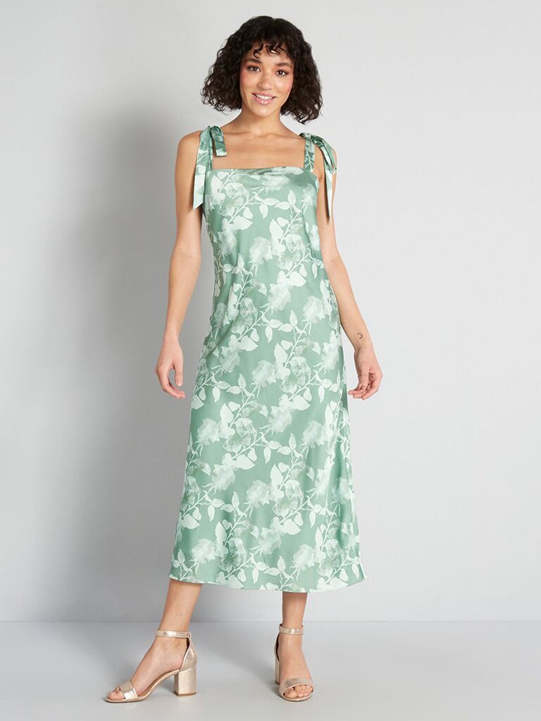 modcloth sage green pastel midi dress for wedding guests with floral print and tie straps
