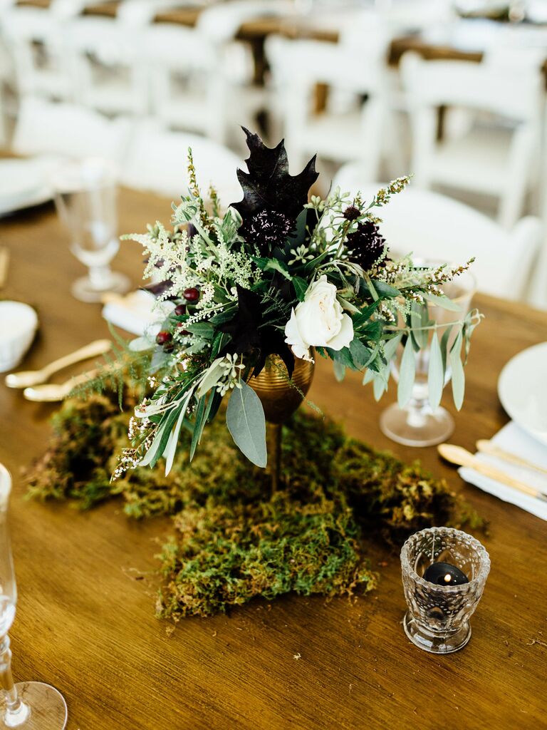 moss, greens and leaves fall wedding centerpiece