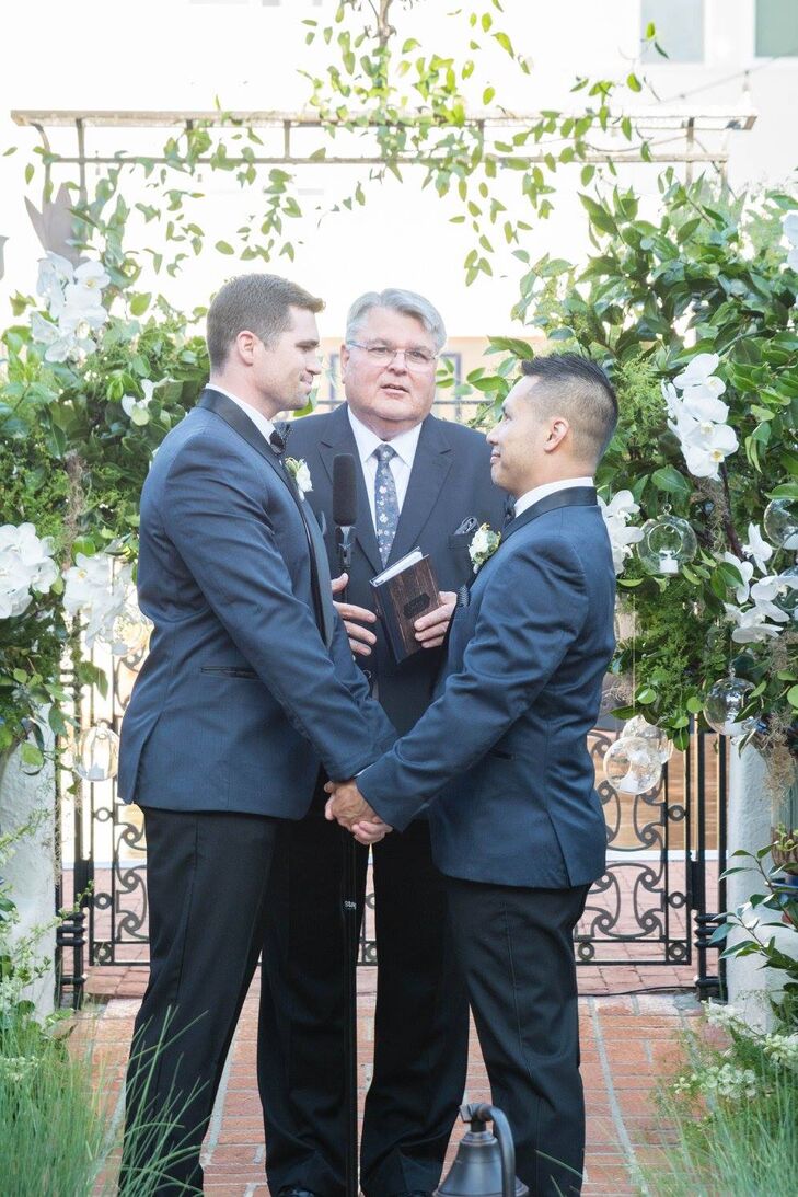 Suspended Orchid, Candle and Greenery Ceremony Backdrop