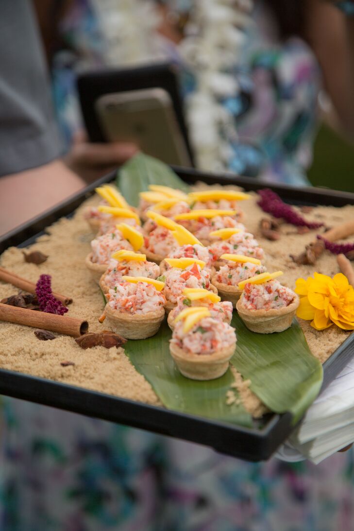 The Four Seasons Resort Maui in Wailea, Hawaii, provided local fare for the reception, including papaya and Hawaiian-style chicken.