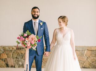 With romantic florals, natural touches and a punchy color palette of pink and gold, Taylor Sevin and Elias Saroufim pulled off an early fall wedding w