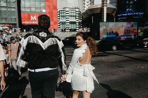 Couple Walking in Downtown Las Vegas During Nevada Vow Renewal