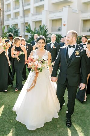 Couple with Wedding Party Dressed in Chic Black Attire