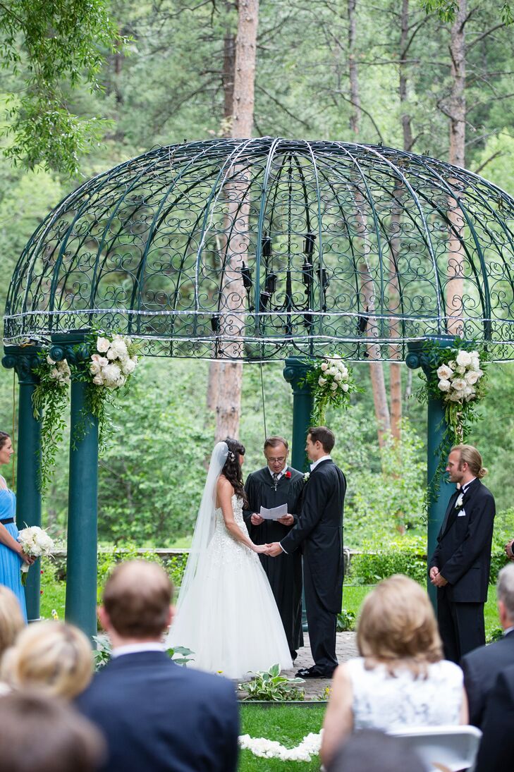 Ashley and Kyle were married beneath wrought iron gazebo on the Dunafon Castle grounds.