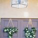 White and Green Hanging Flower Signs