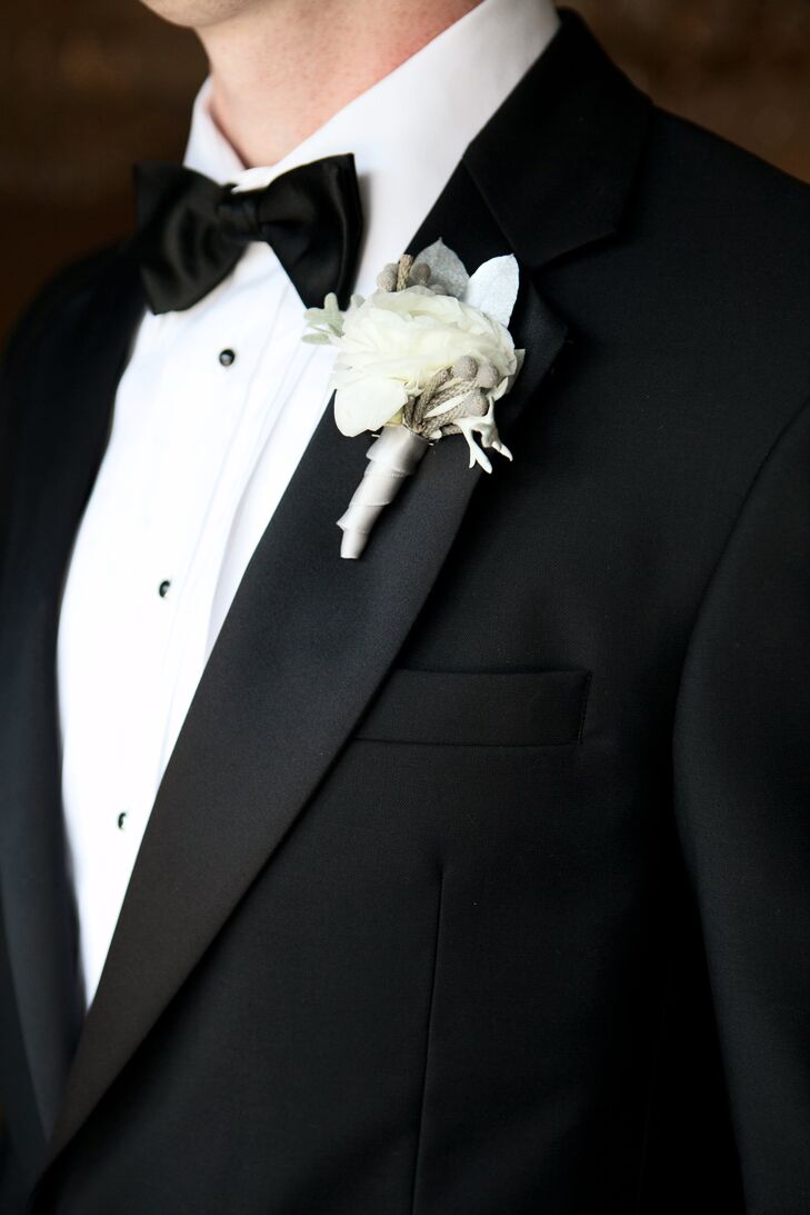 The guys wore a white rose with silver brunia and lamb's ear.