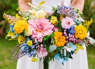 Rachel and Drew knew early on that they wanted a camp-themed wedding, but also knew their families would appreciate something a bit more formal. After