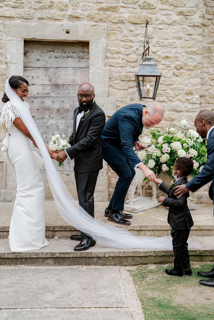 Ring Bearer Giving Ring to Officiant at The Club at Houston Oaks in Texas