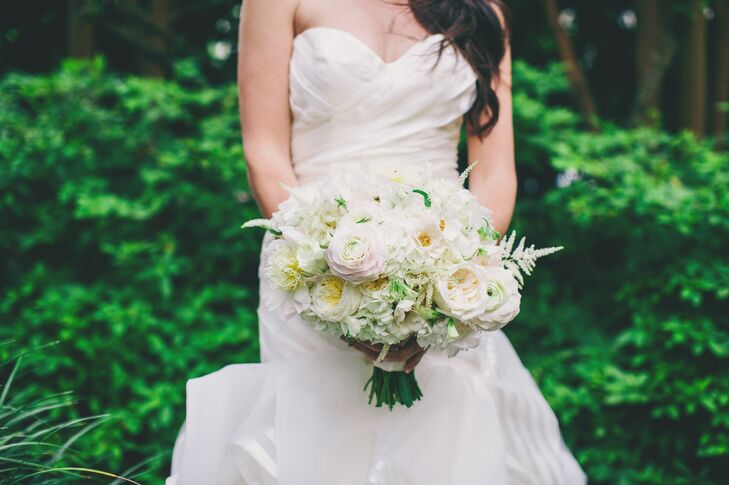 Courtney carried white hydrangeas, blush ranunculus, champagne garden roses, white magnolias and white astilbes in her lush bouquet. She loved how the flowers matched the stunning natural surroundings of Charleston, South Carolina.