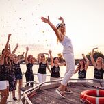 Bride and bridesmaids on a boat at bachelorette party