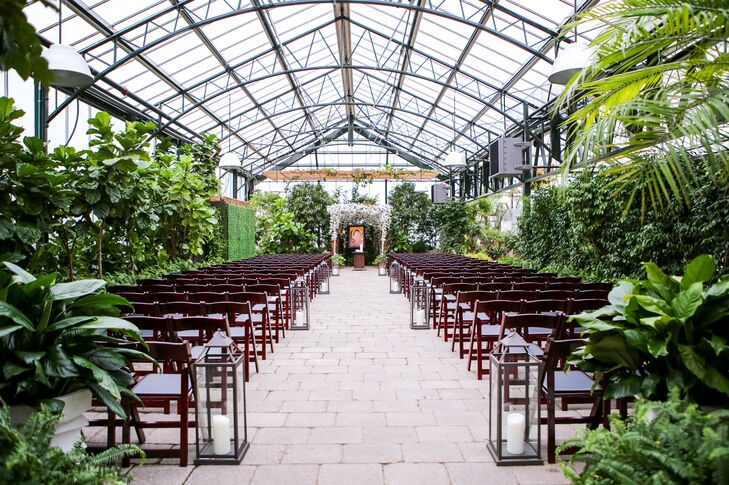 “You felt like you were in a tropical garden," Katina says of their ceremony space at Planterra Conservatory in West Bloomfield, Michigan.