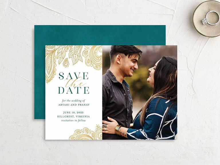 Gold ornamental detailing bordering event details in teal on left side, personalized photo on right