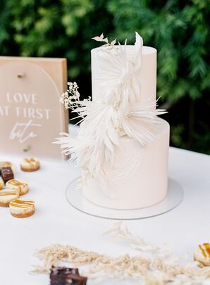 Two-Tier White Cake With Dramatic Textured Decorations