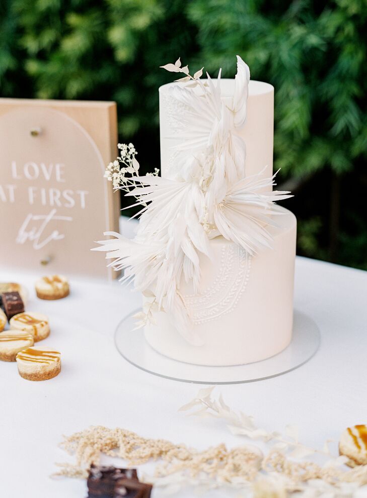 Two-Tier White Cake With Dramatic Textured Decorations