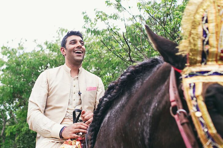 The wedding day celebration commenced with Neeraj's baraat, the groom's side parade around the resort that led to the bride and the ceremony location. He rode a horse decked in colorful draping.