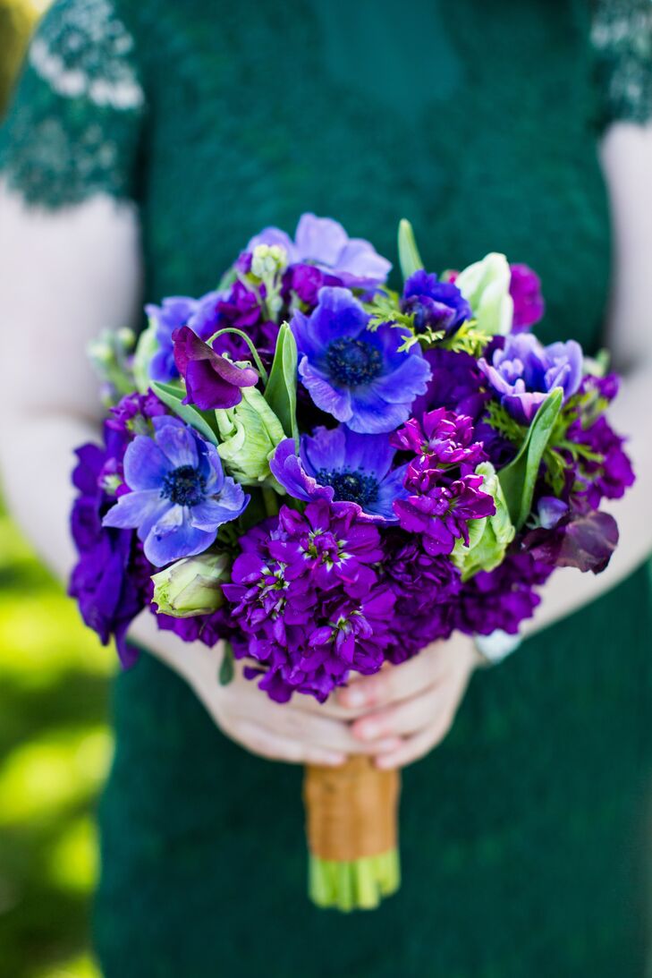 Each bridesmaid carried her own unique bouquet--this one featured a lovely arrangement of stock, anemones, sweet peas and tulips