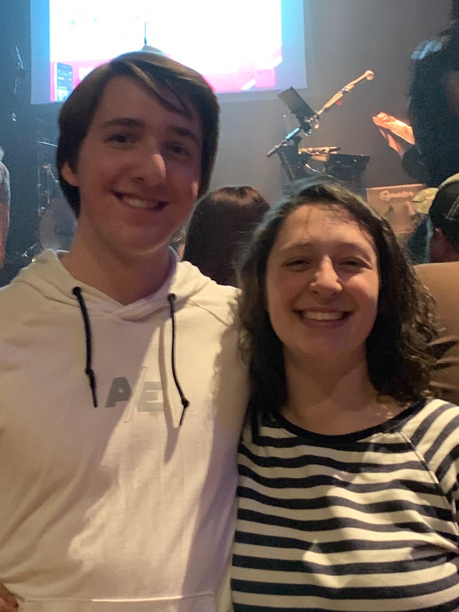 We take a very sweet photo surrounded by people three decades older than us on average (Billy Joel/Elton John cover band show).....