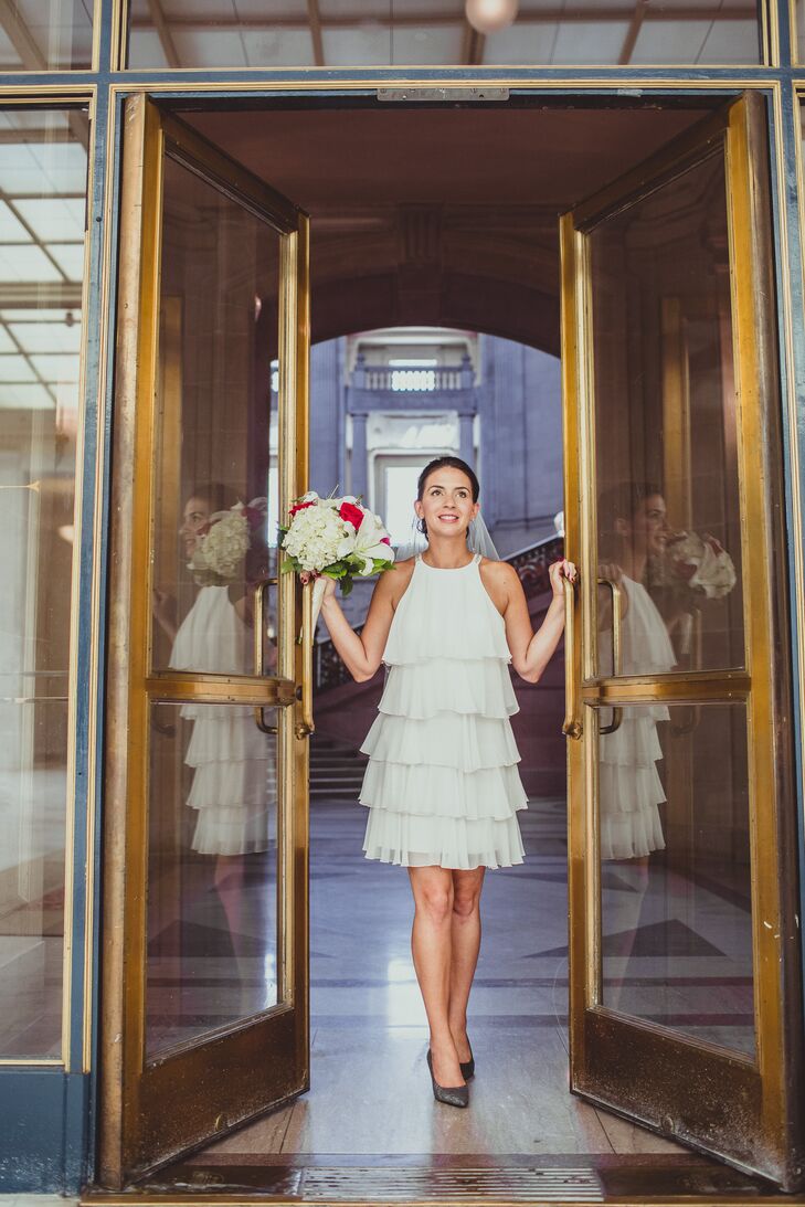 "My dress had white beading on the straps that matched the beading on my veil perfectly," says Tina. "I chose the dress that made me feel the most like a vintage courthouse bride."