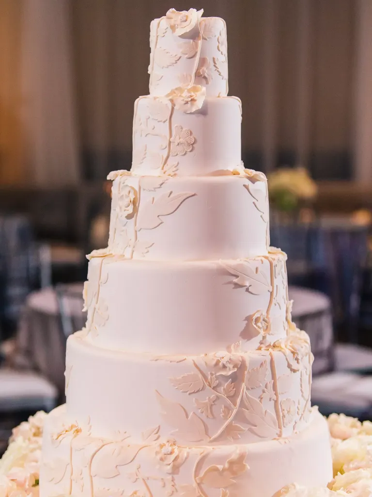 Ivory Wedding Cake With Floral Cutouts