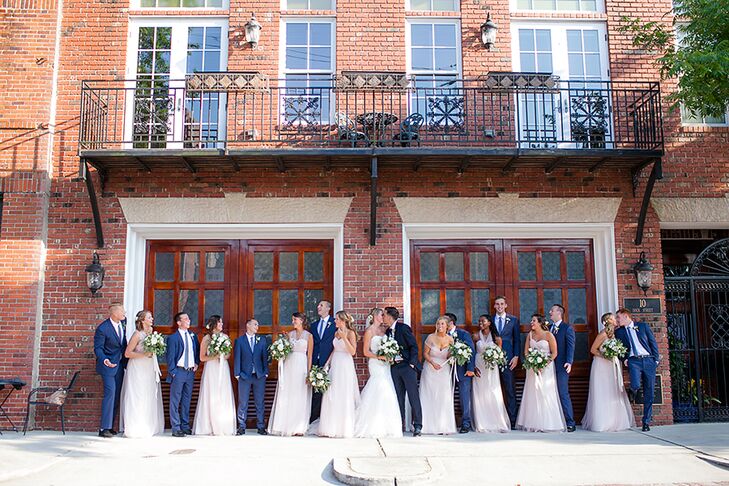 Christi ad Tanner knew that having a sophisticated wedding they could look back on and admire in years to come was very important to them. Instead of going with some of the trendier looks, the pair stuck to a simple palette and dressed the wedding party in classic-cut navy suites and floor-length gowns.