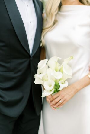 Groom and Bride Holding Simple, Elegant Bouquet of All-White Calla Lilies for Garden Wedding