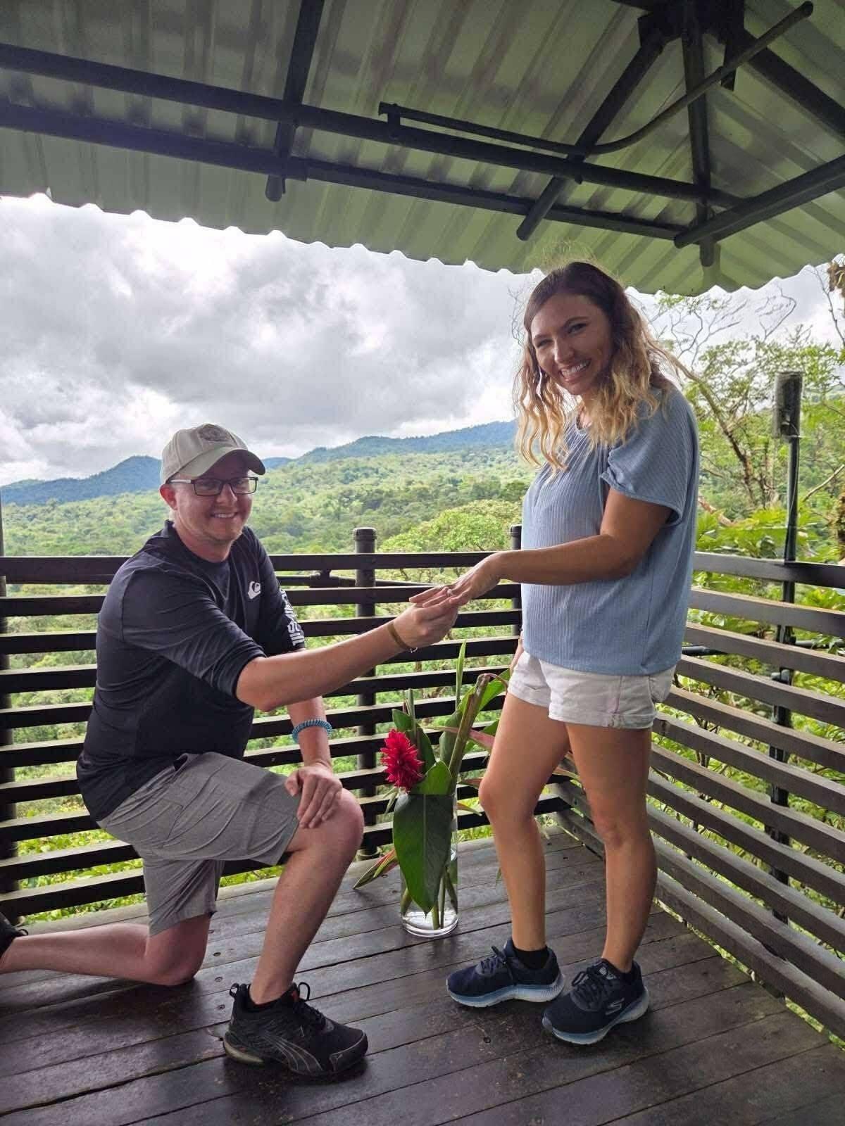 We got engaged!!!! On our excursion to La Sensoria in Costa Rica, we climbed up to the top of an overlook of the rainforest. I turned around to find Tyler on one knee. He said he loves me and he wants to marry me.  It was the best day! We spent the rest of the day enjoying the hot springs in the rainforest and learning about animals. ~ Bethany