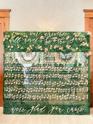 Whimsical Music-Themed Escort Card Sign with Greenery