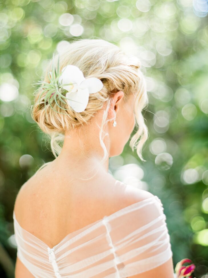 Elegant Bridal Updo with Flower Accents