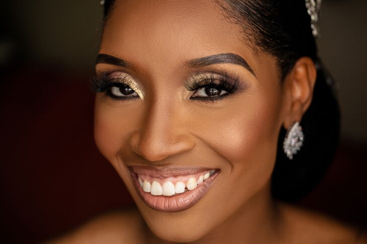 Bridal Getting-Ready Close-Up Shot With Gold Makeup and Big Earrings