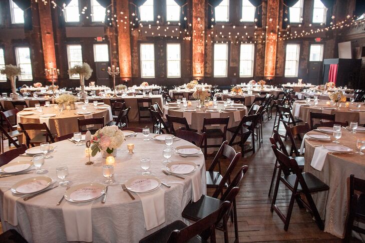 String lights hung overhead Amber and Andy's wedding reception at the Turner Ballroom, adding romantic lighting to the venue.