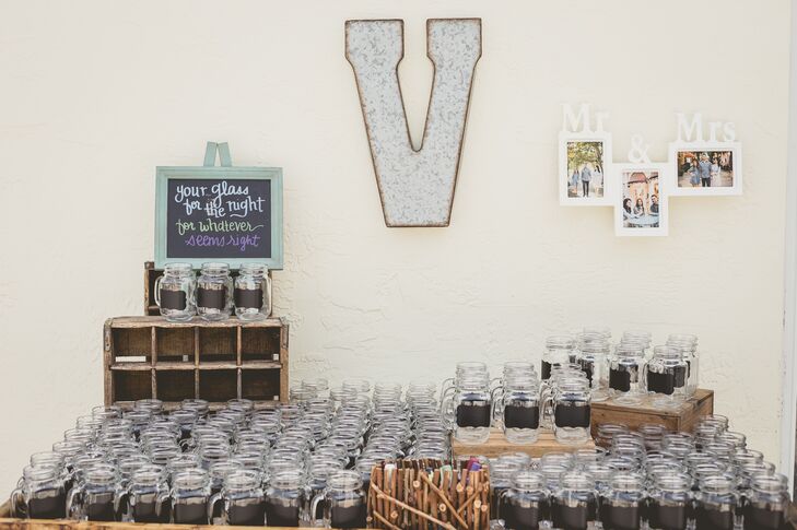Labeled mason jar favors were the perfect match for Roxy and Rodney’s signature drinks. She made multiple batches of her famous sangria two days before the wedding. “I didn’t want my guests to show up and find that my sangria had been hijacked by a fake from the caterer,” she says. Roxy even made the sour mix for Rodney’s whiskey sour with fresh ingredients. Thanks to their custom mason jars, guests could try each one and not lose a drop of the homemade goodness to a mistaken cup.
