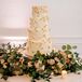 Orange-and-White Wedding Cake at the Royal Crest Room in St. Cloud, Florida