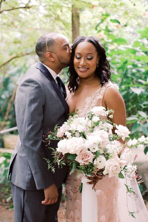 Bride and Groom With Blush-Toned Gown and Bouquet
